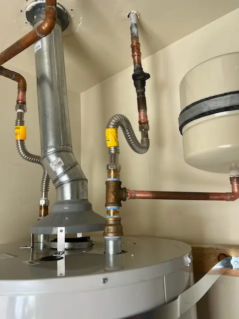 Water heater installation and plumbing repair in Songwood
